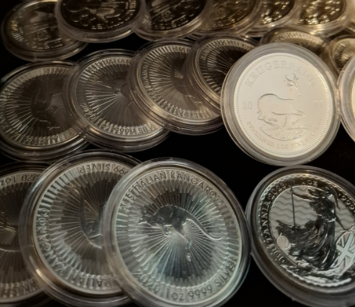 1 oz "tilfeldig motiv" i kapsel